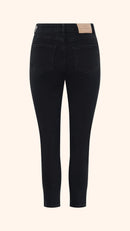 Slim, straight, high rise black petite jeans, back view