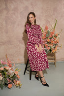 Women's petite autumn smocked midi dress with modern poppy print on a plum base