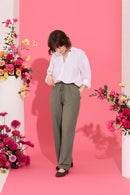 Wide leg, tie waist, khaki casual summer petite trousers in linen and cotton, worn by model standing