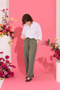 Wide leg, tie waist, khaki casual summer petite trousers in linen and cotton, worn by model standing