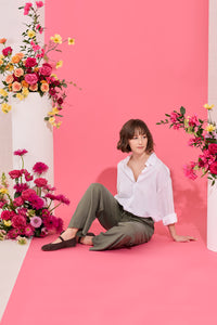 Wide leg, tie waist, khaki casual summer petite trousers in linen and cotton, model sitting