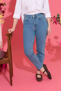 Slim, straight, high rise blue petite jeans close up front view