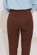 Petite tailored cigarette trousers with pleat detail in brown, rear close up view