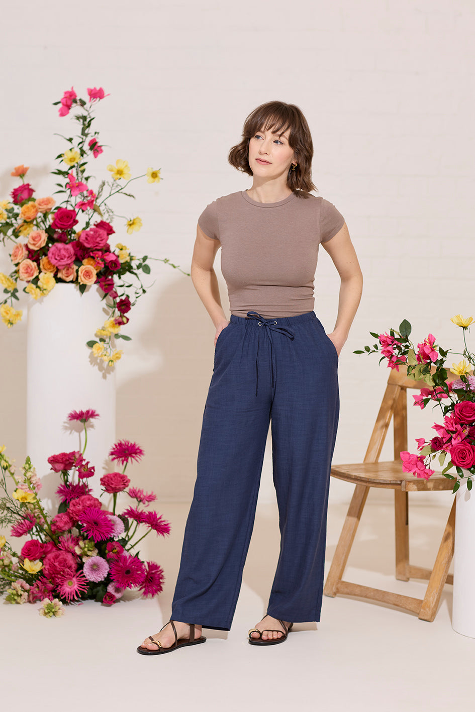 Wide leg, tie waist, navy casual summer petite trousers in linen and cotton, model standing