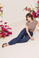 Wide leg, tie waist, navy casual summer petite trousers in linen and cotton, model lying down